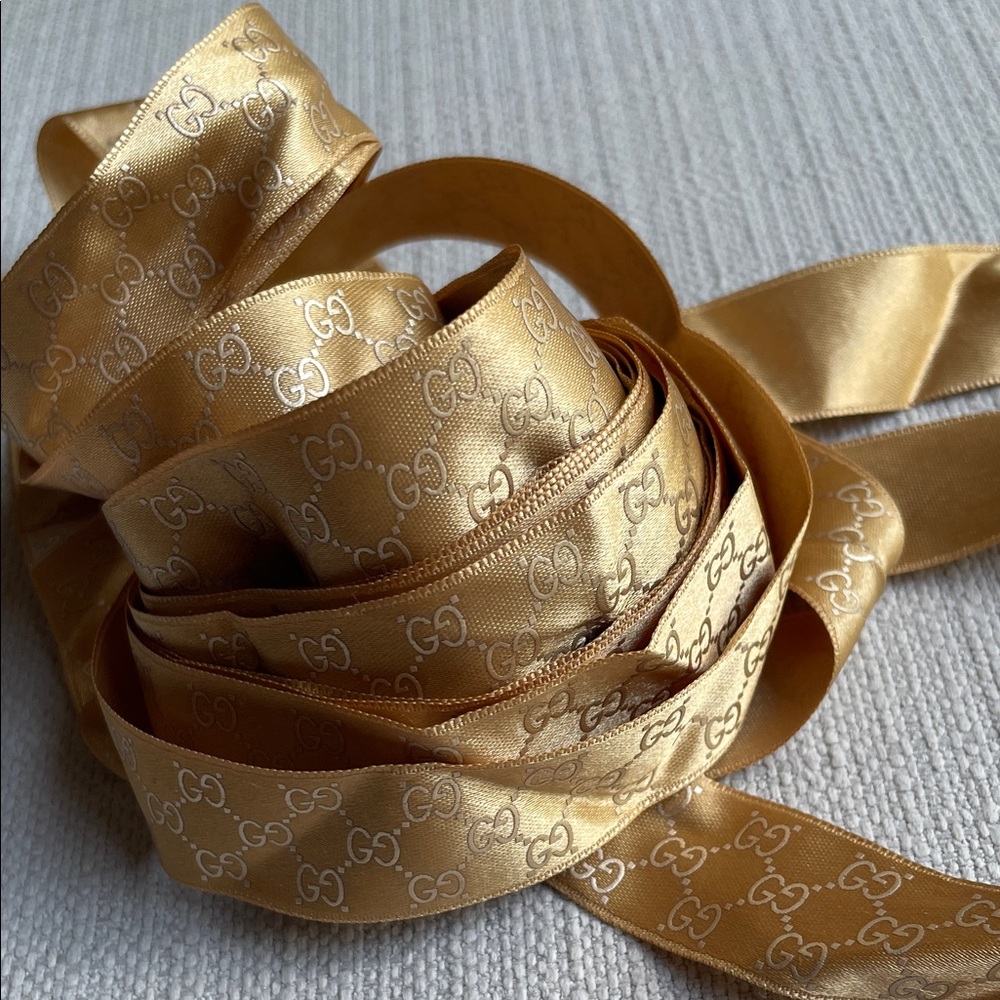 Gucci Gold Satin Ribbon with Interlocking GG Motif